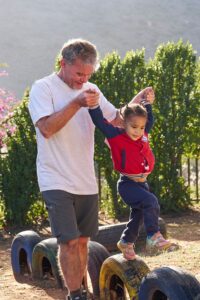 community-upliftment-volunteer-with-child