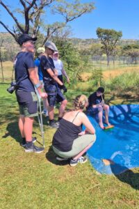 Big Cat Rescue & Sanctuary - Volunteers interacting near a water pool